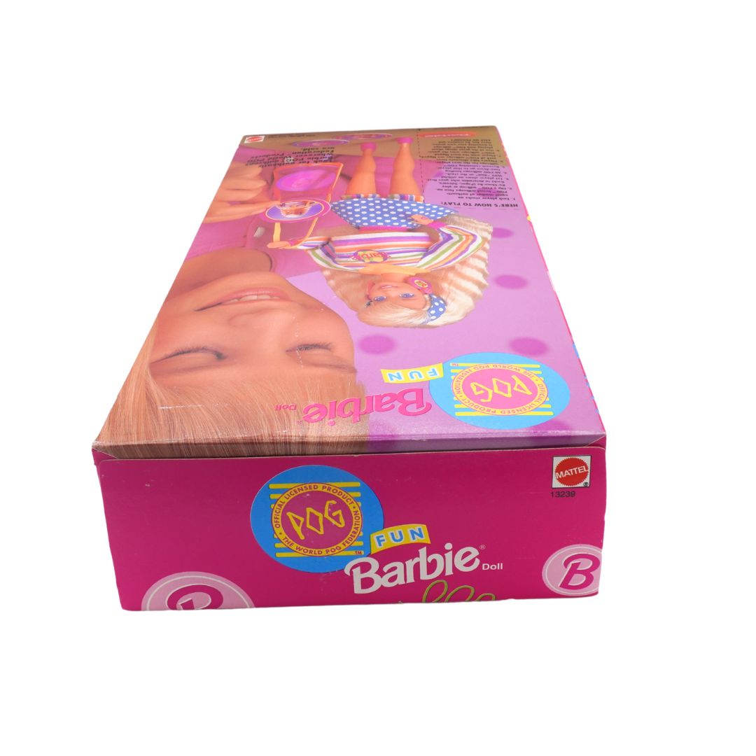 Barbie doll packaging with a pink background and visible branding.