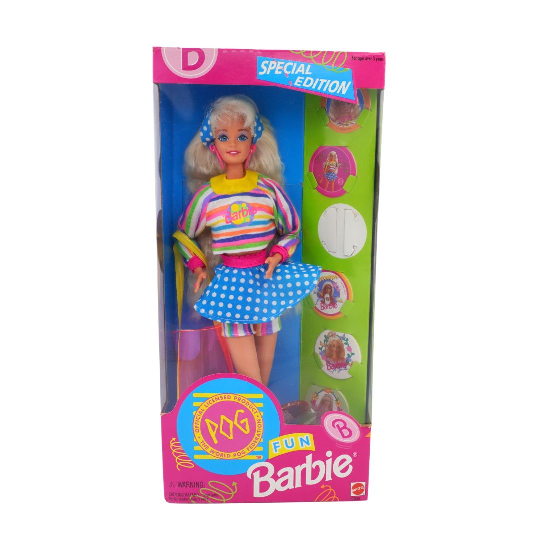 Barbie doll in packaging with colorful outfit and accessories