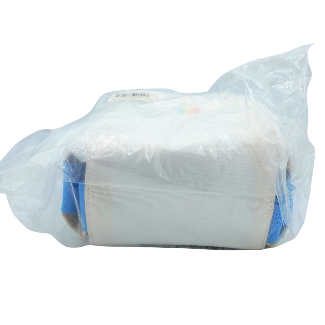 A white rectangular plastic bag or pouch sealed inside a clear plastic outer package, photographed on a plain white background.