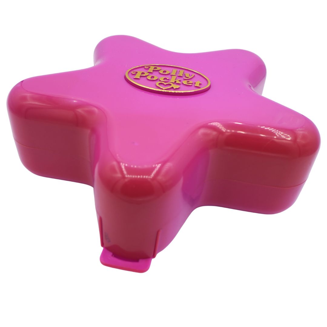 Pink star-shaped container with 'Polly Pocket' logo on a white background