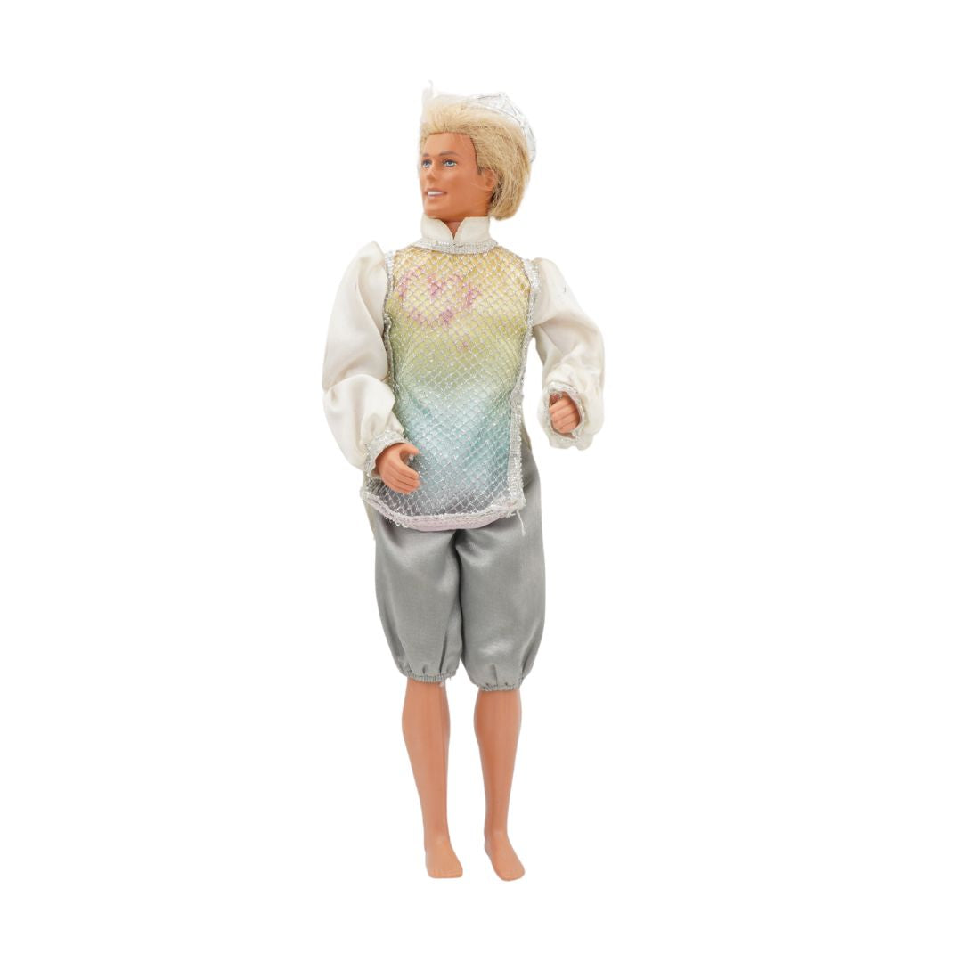 Barbie doll with a colorful shirt and gray pants on a white background