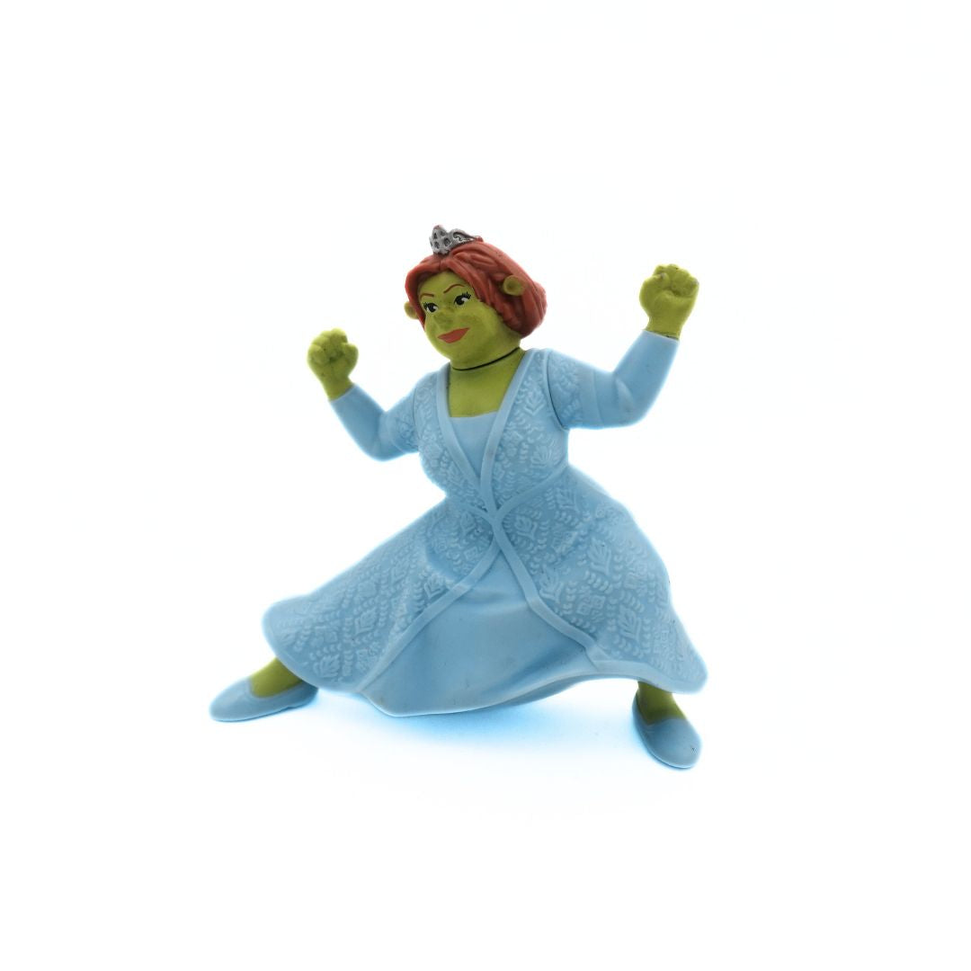 Front on photo of a 2007 McDonalds Shrek the Third Princess Fiona Figure with green skin, red hair and a blue dress