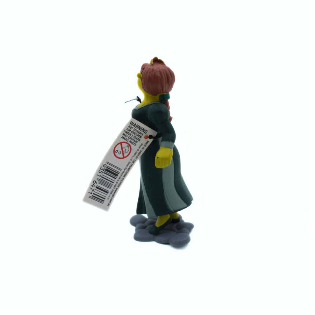 Toy figure with a warning label on a white background
