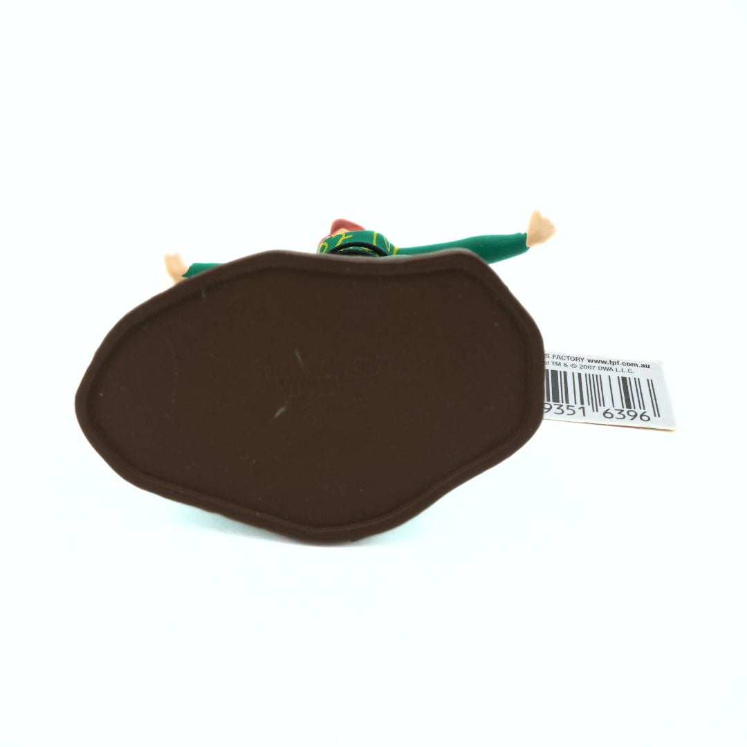 Brown figure stand with a tag on a white background