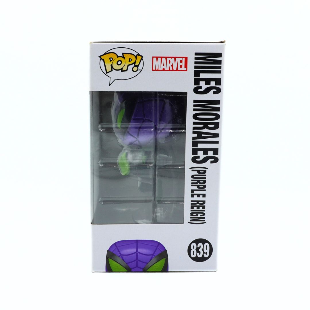 Funko Pop! Marvel Miles Morales (Purple Reign) vinyl figure in its original window box packaging, featuring a purple and green spider-themed design.