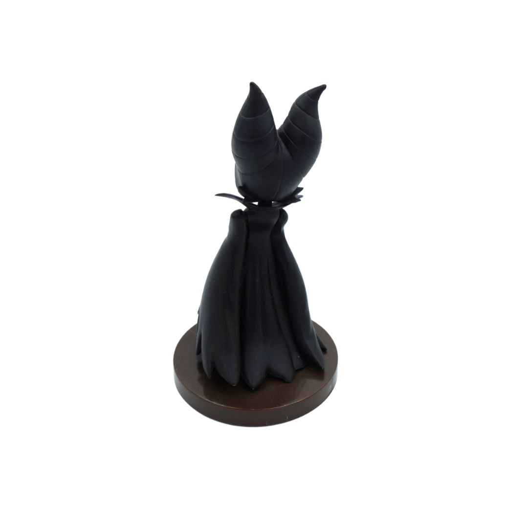 Photo of the back of a Maleficent figurine wearing black