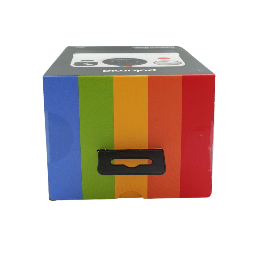 A black and white polaroid camera in a black box, titled the Polaroid Now, with a rainbow top