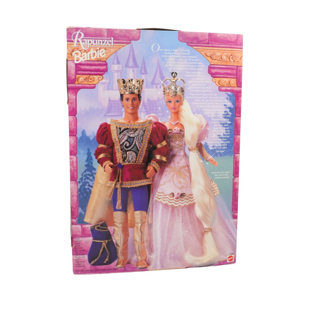 Rapunzel Barbie and Prince Doll packaging with castle background