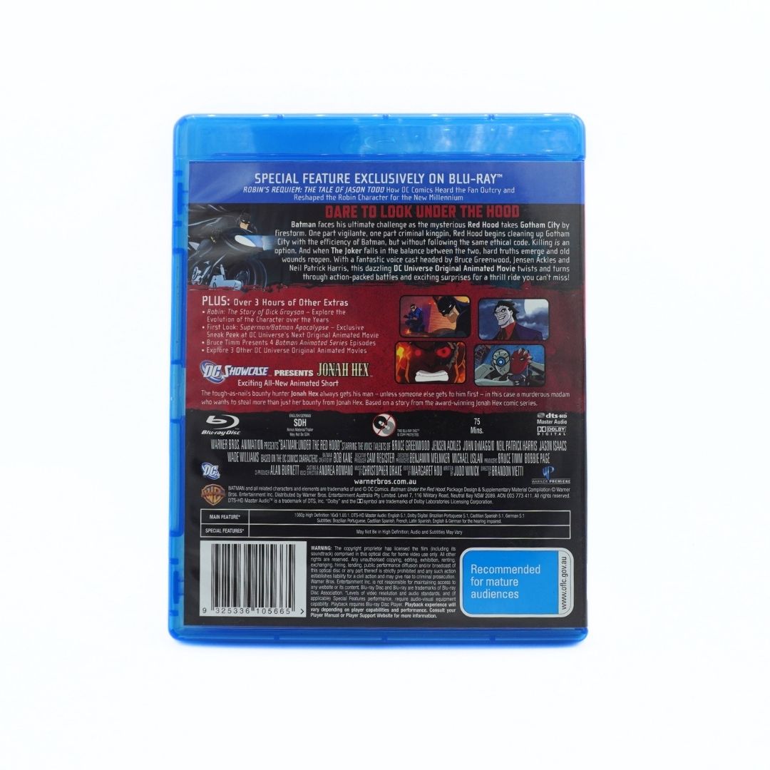 The back cover of a Blu-ray case for 'Under the Red Hood' special feature, showing the blue plastic case, barcode, and movie details on a white background.