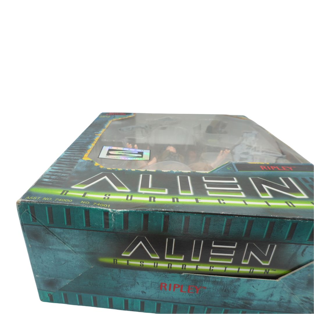 Boxed toy figure of an alien from the 'Alien' series by Ripley on a white background