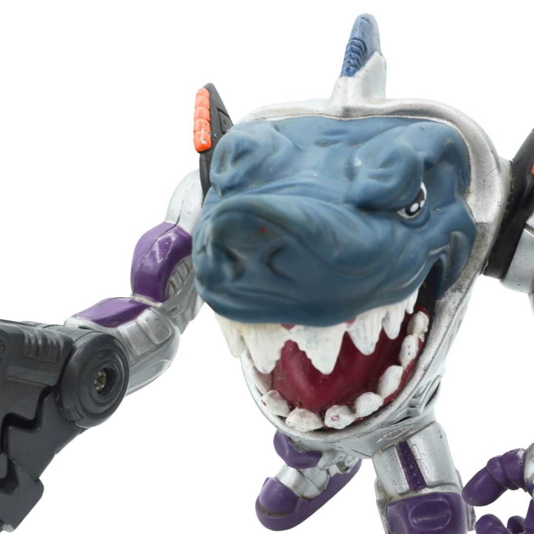 Close-up of a toy figure with a blue and purple design on a white background