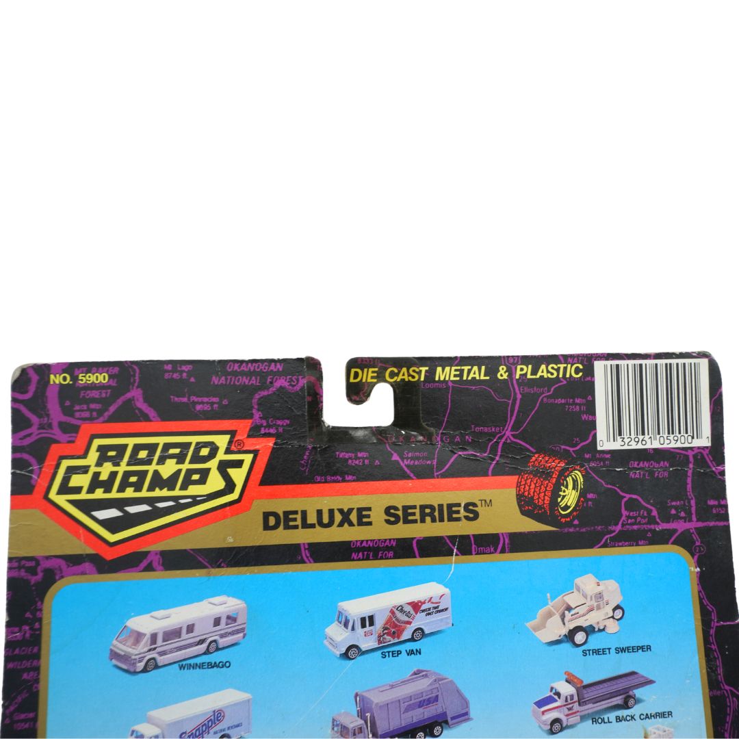 Packaged toy truck set from Road Champs Deluxe Series on a white background