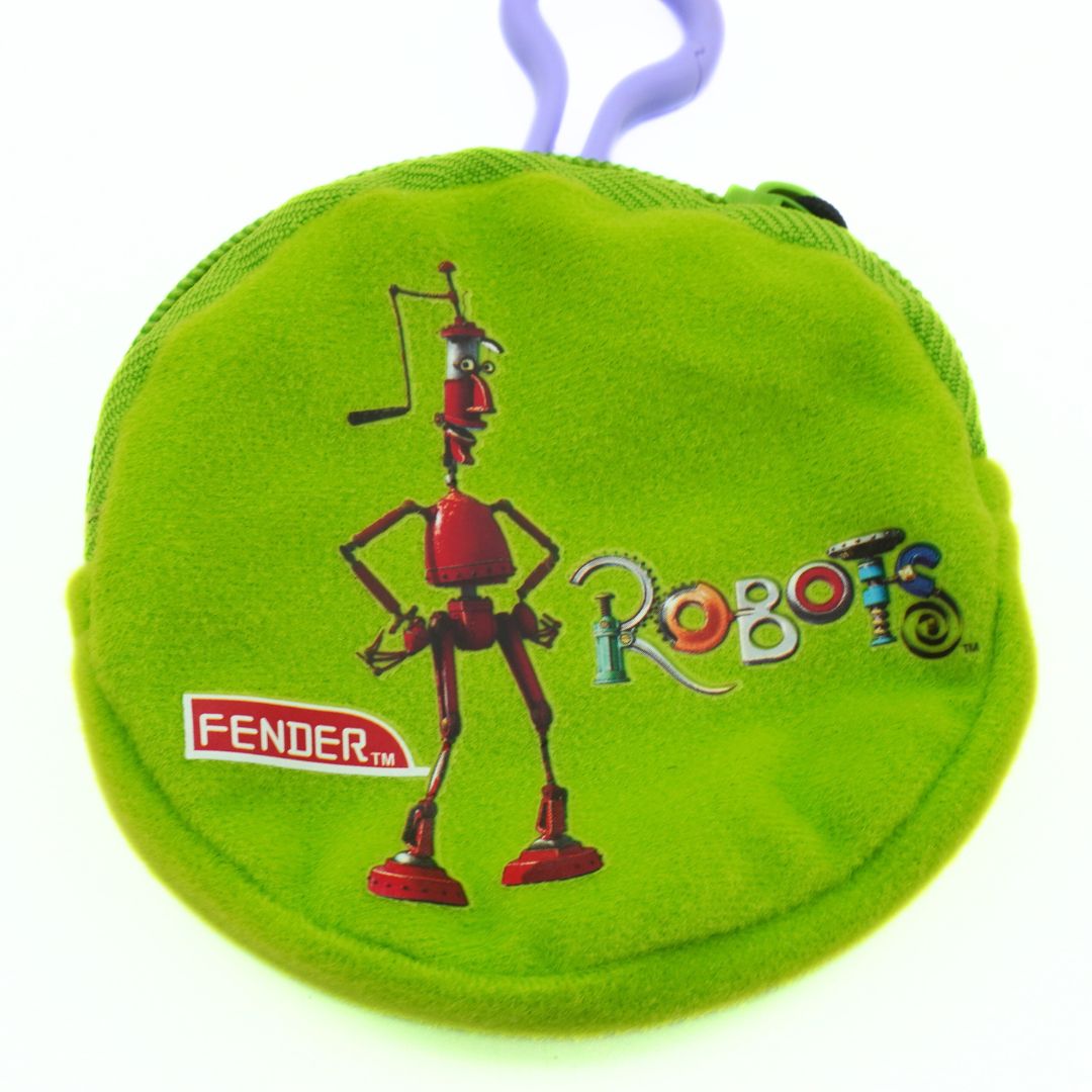 Green plush toy with a robot design and Fender logo on a white background