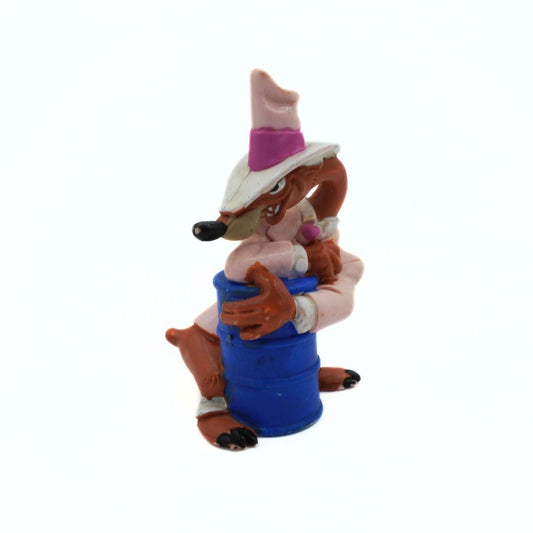 Animated character figurine with a pink hat and blue object on a white background