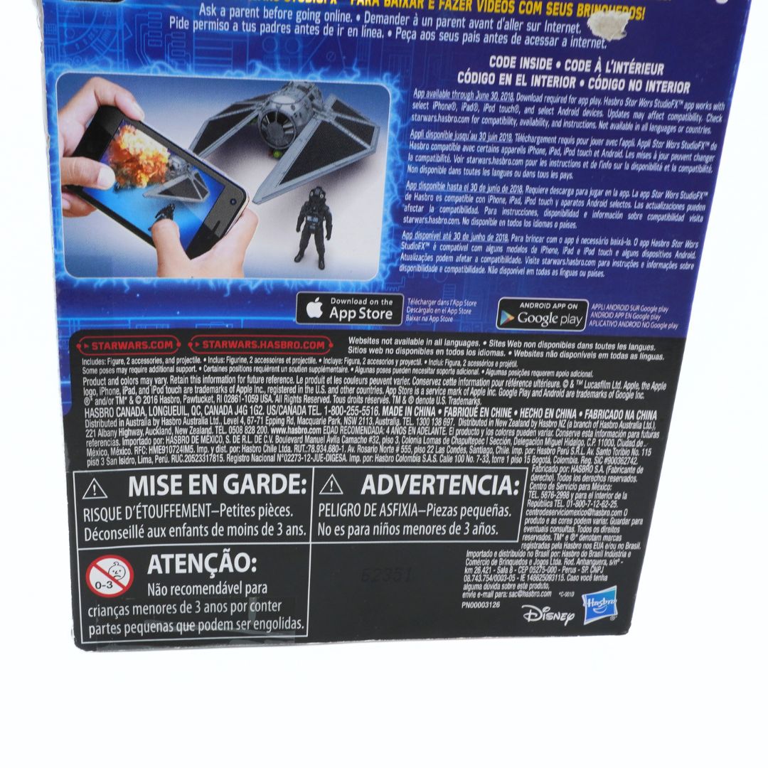 Back of a toy packaging with smartphone app compatibility and warning labels.