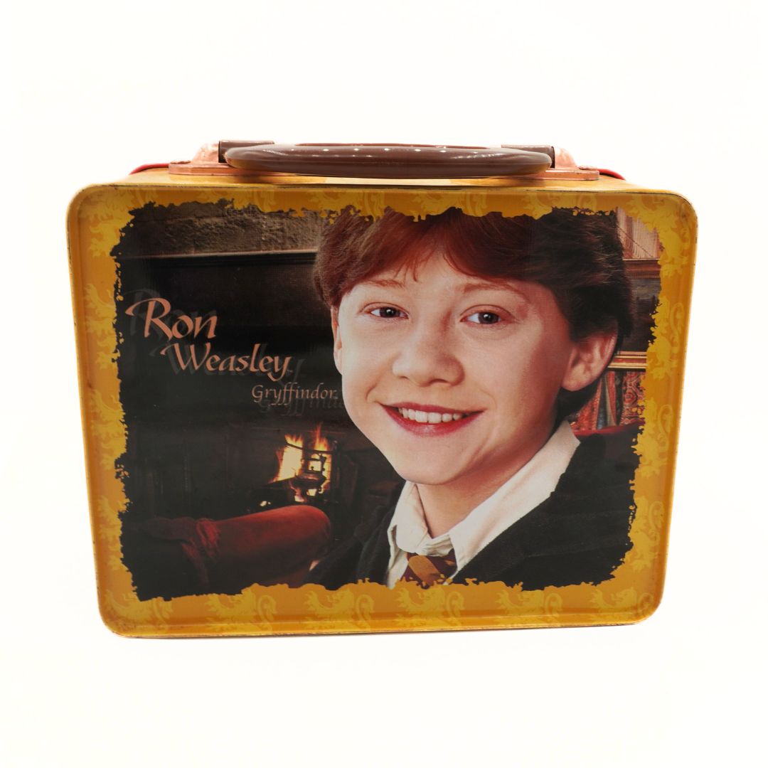Lunch box with a portrait of a young boy and text on a white background