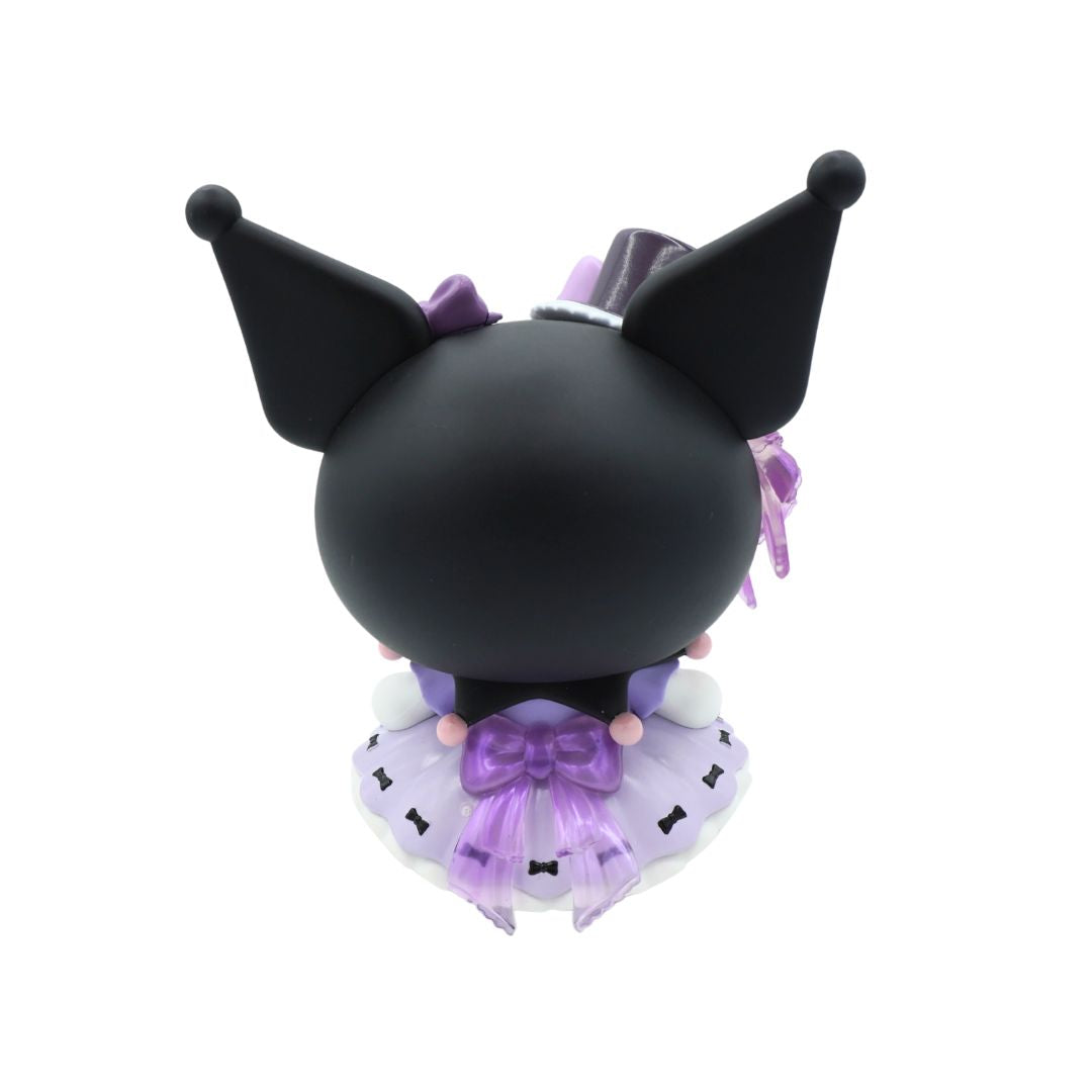 A cute black cartoon character figurine with pointed ears, a purple bow, and a purple tutu skirt, shown from the back on a plain white background.