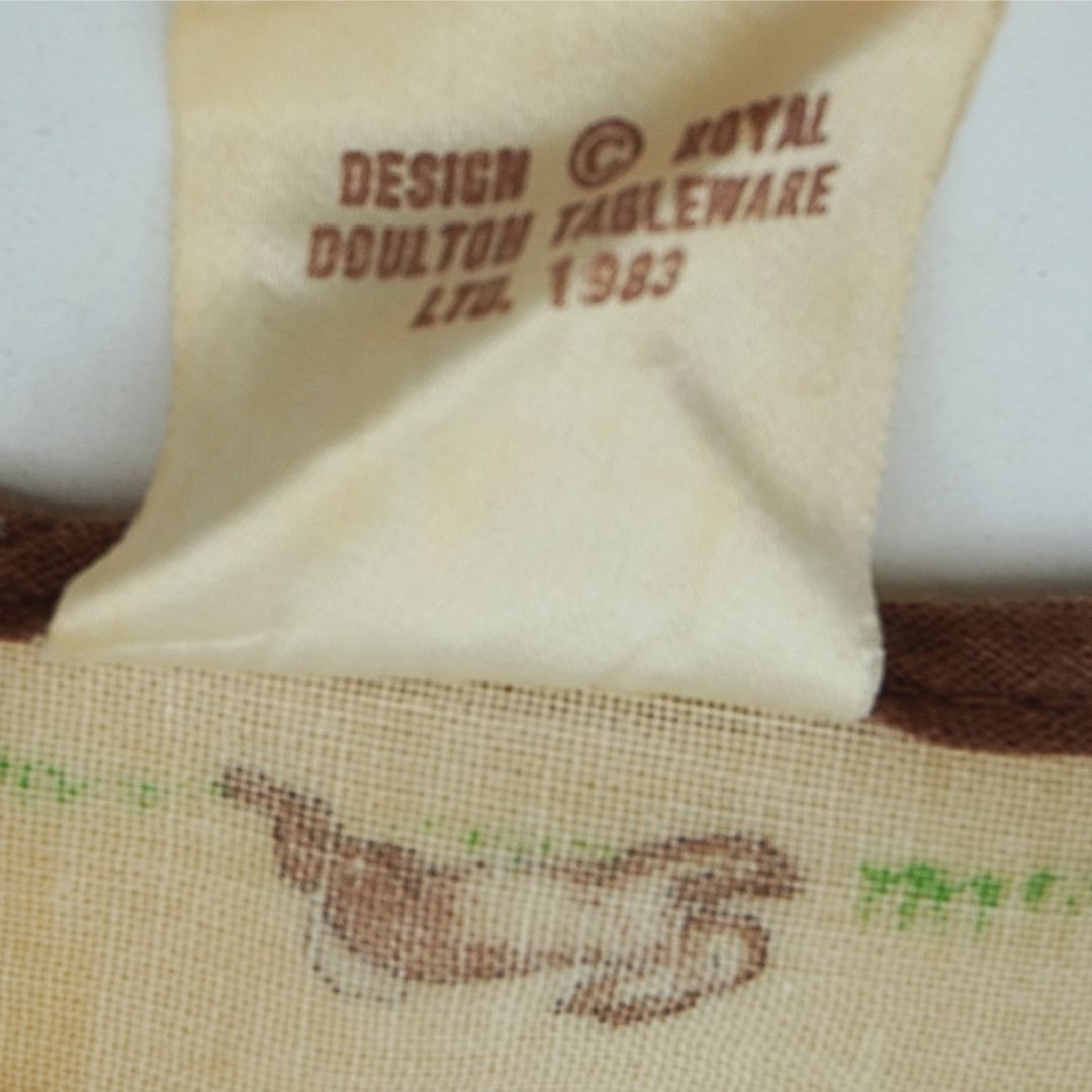 Close-up of a Royal Doulton tableware product with branding text.