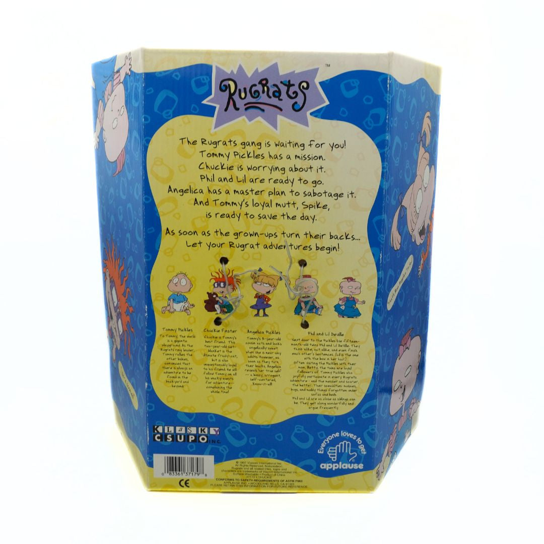Back of a toy packaging with 'Rugrats' branding and character illustrations.