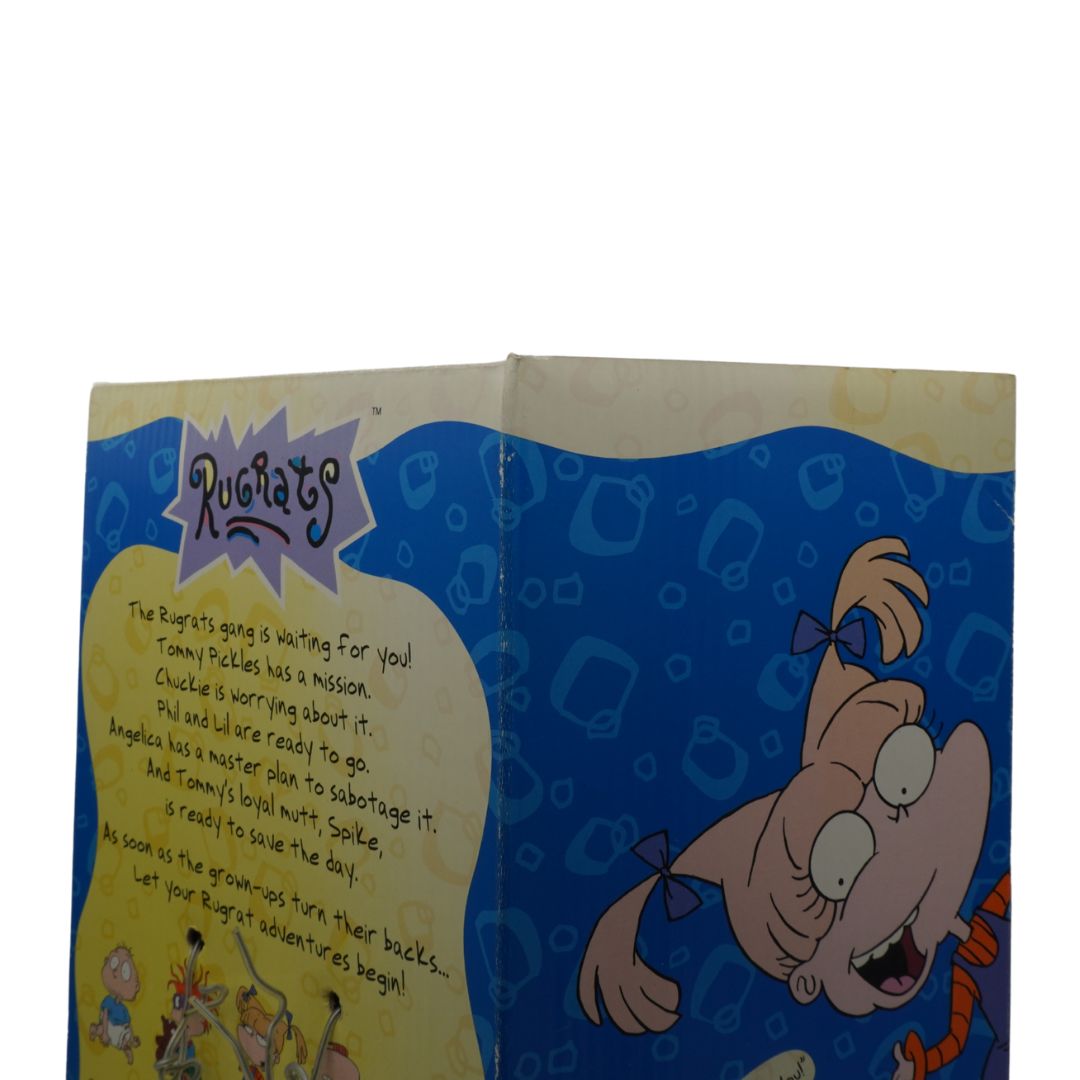 Cartoon character from 'The Rugrats' series on a blue background with text.