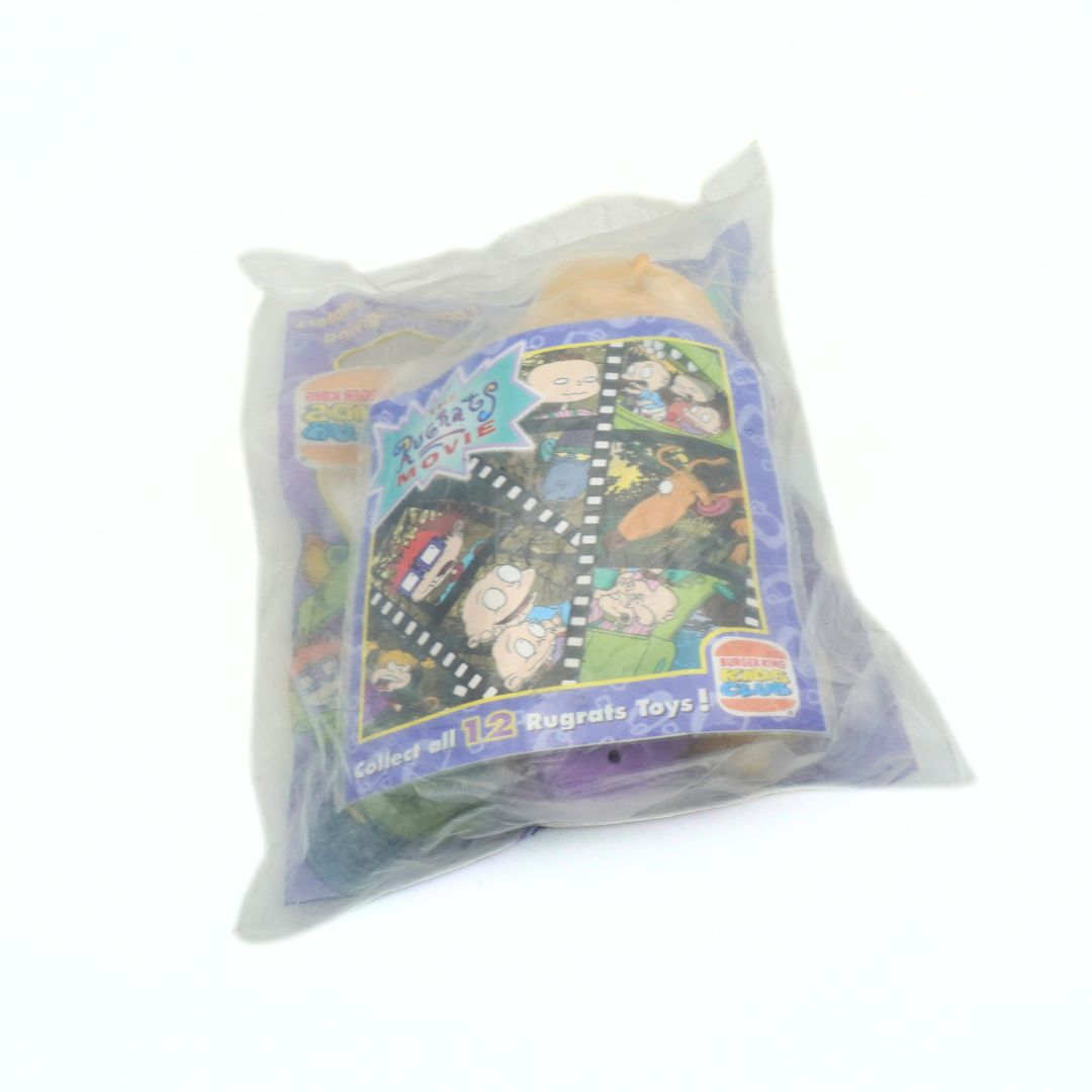 Back of an unopened Rugrats Movie Burger King toy featuring Tommy and Dil Pickles, released in 1998