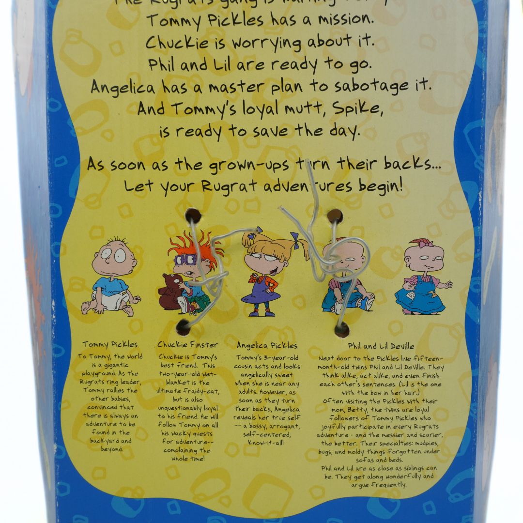 Back of a toy packaging with text and character illustrations on a yellow and blue background