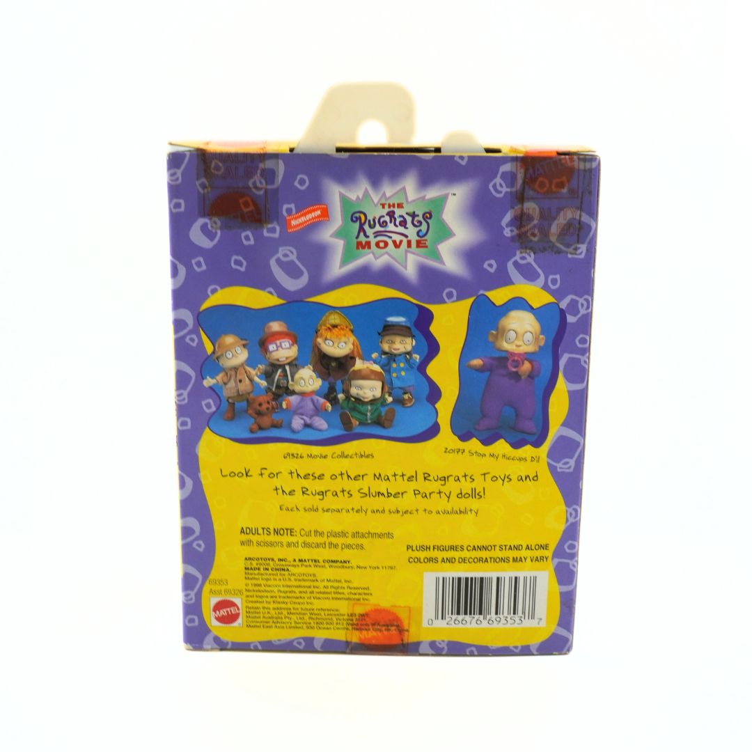 Photo of the back of the packaging on a 1998 Rugrats Movie Angelica doll showing the others in the collection