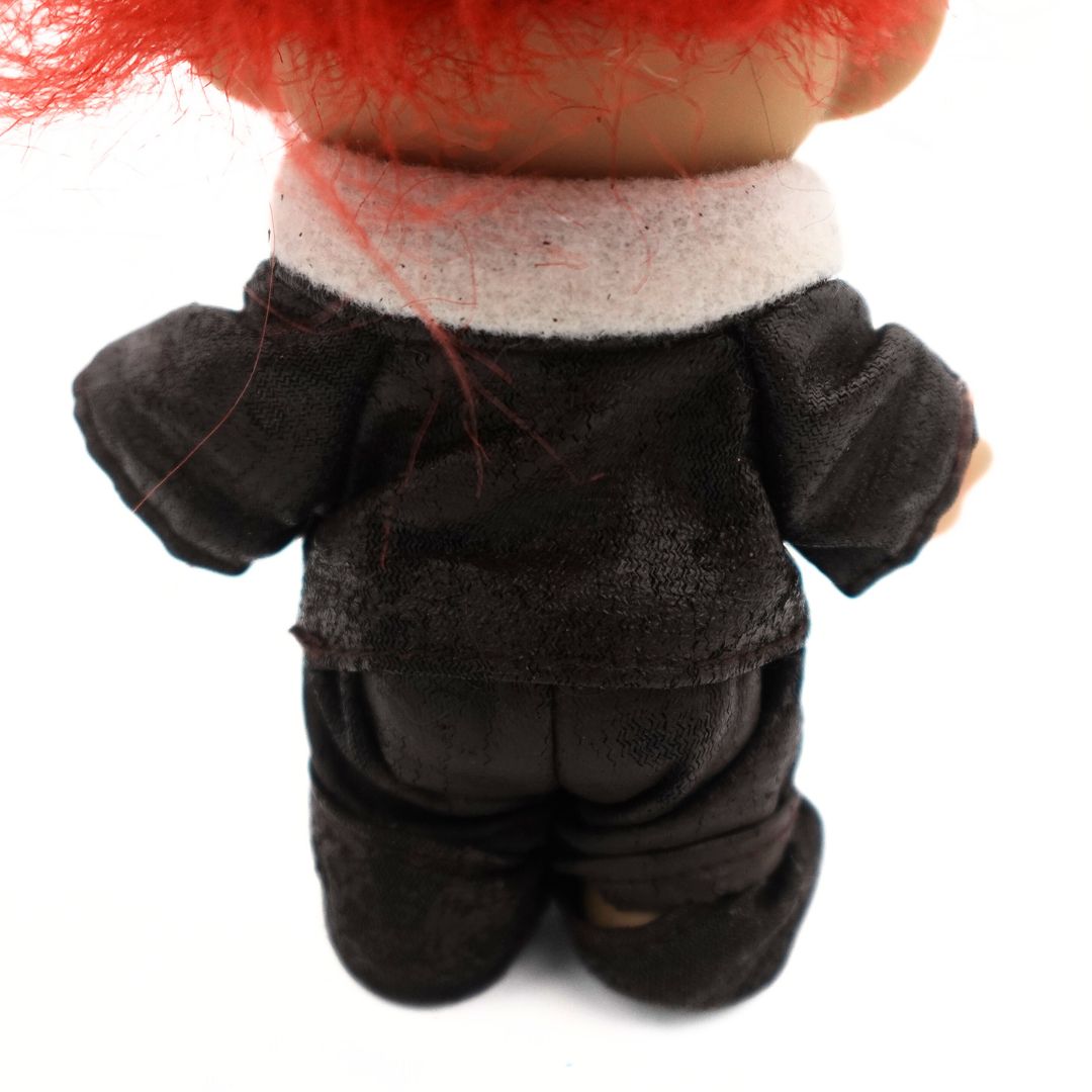 Close up of the fabric on the Russ Troll Doll pilot showing some wear