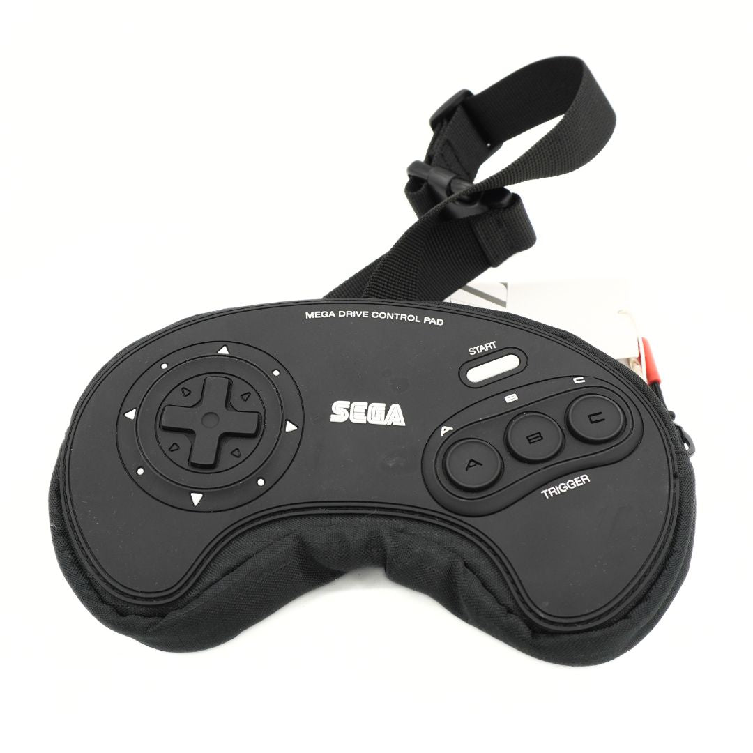 A black and white bumbag/fanny pack with a Sega Mega Drive controller design