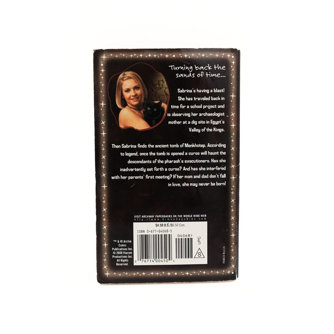 Photo of the back of the 2000 Sabrina the Teenage Witch Mummy Dearest book with the plot description and a photo of Sabrina  and Salem the cat