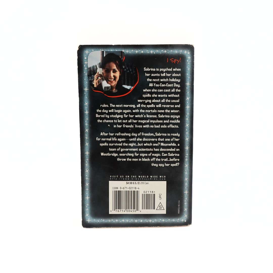 Back cover of the Sabrina the Teenage Witch Spying Eyes paperback showing the plot description and barcode