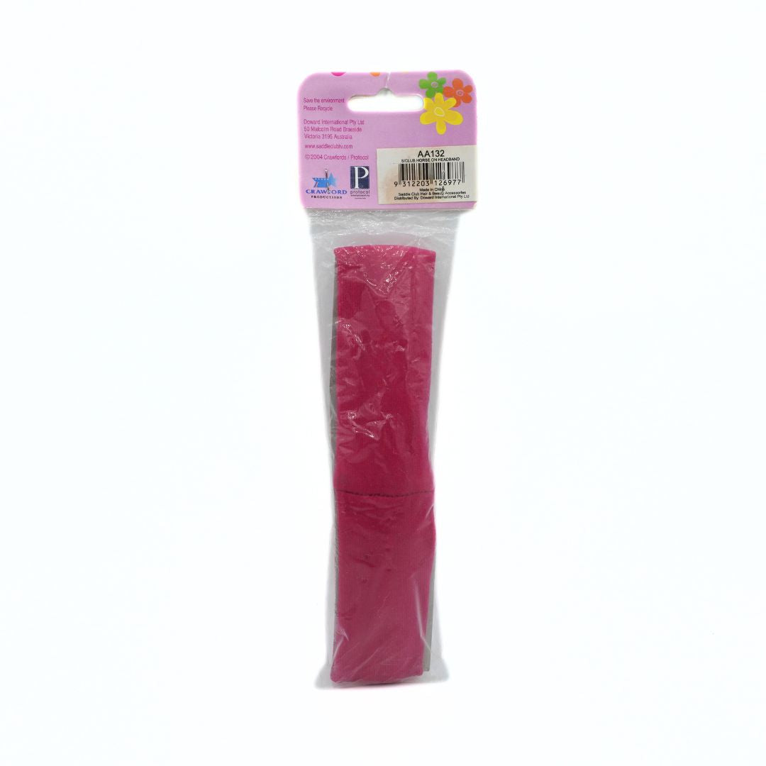 Pink hair tie in clear packaging with a colorful label on a white background