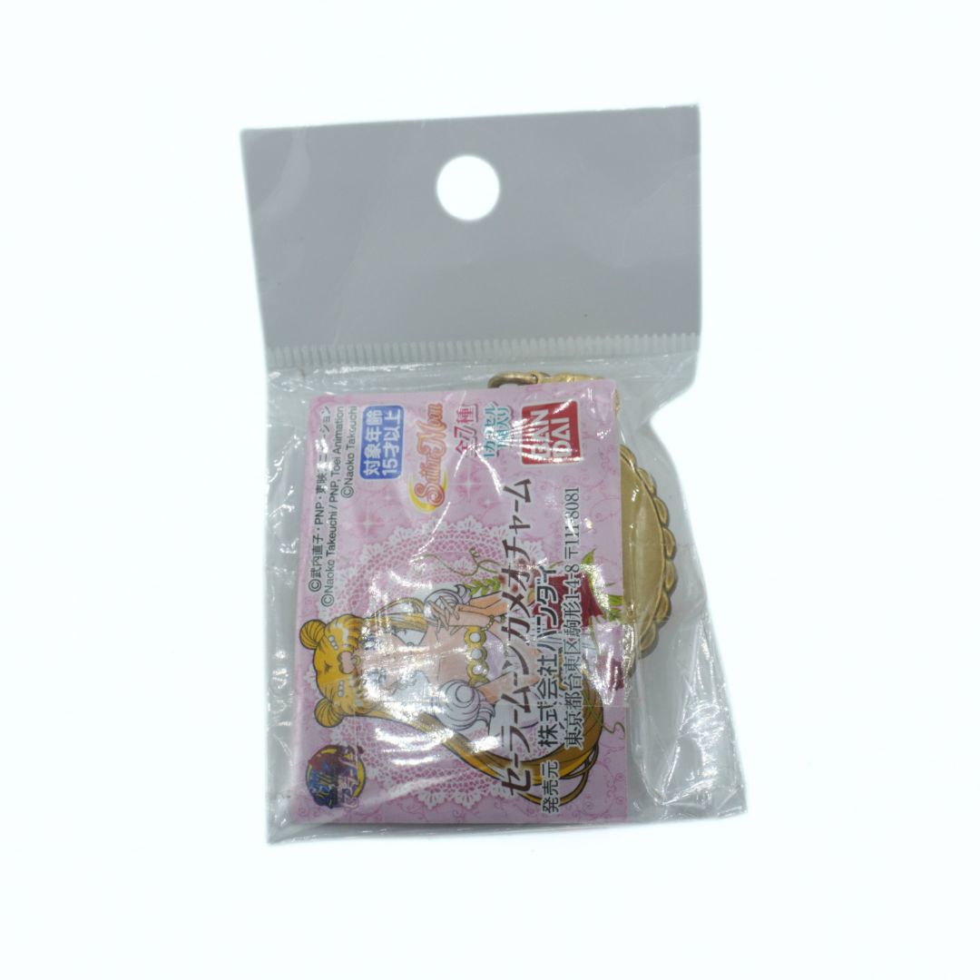Small package with a pink label on a white background