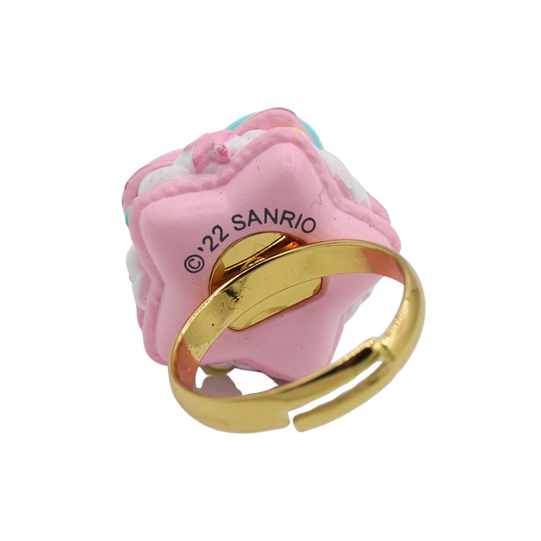 A Sanrio character ring featuring a pink and white marshmallow design with a gold-tone band, shown on a plain white background.