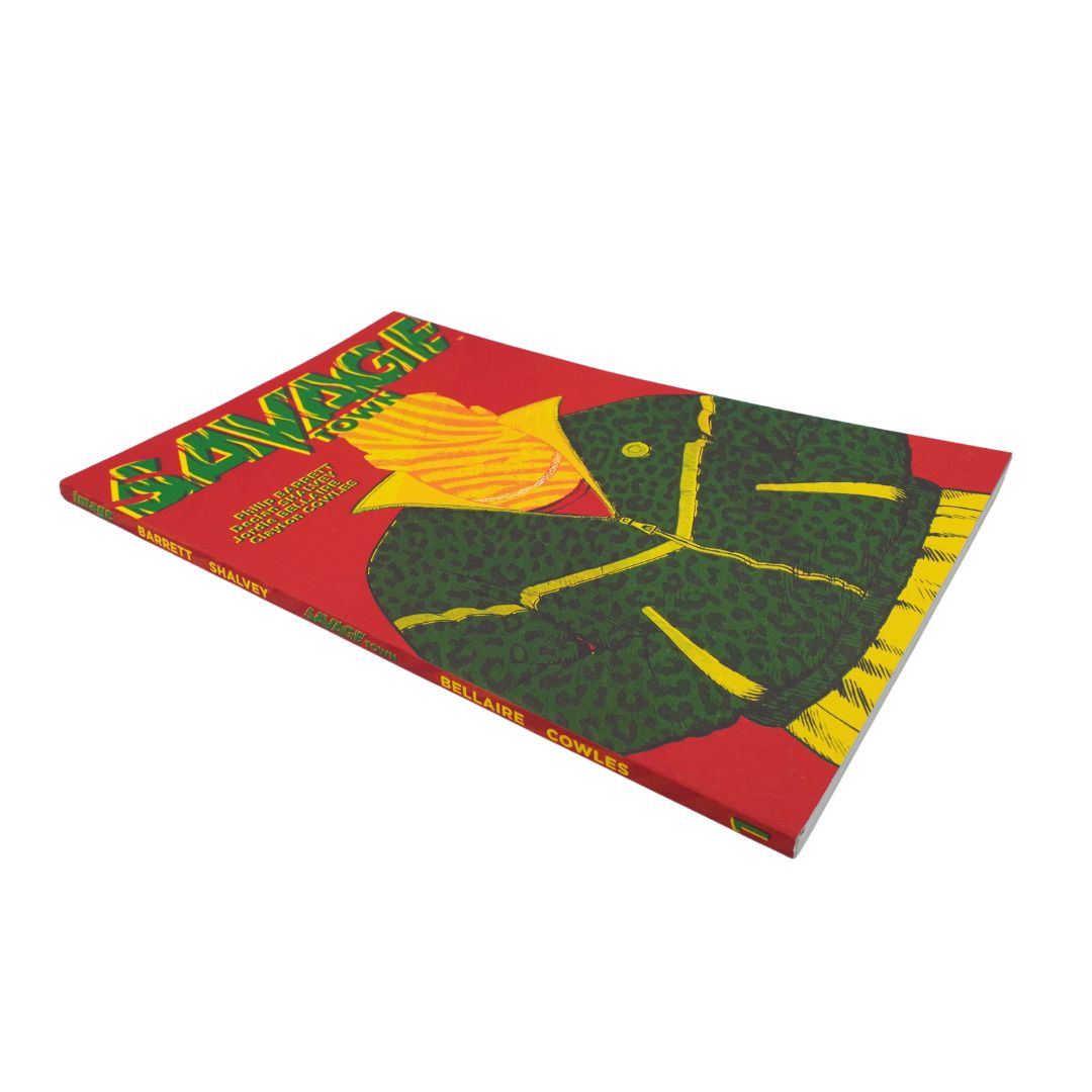A book titled Savage Town shown at an angle on a plain white background. The cover features a bold red background with a large green patterned shape outlined in yellow and a yellow flower graphic.