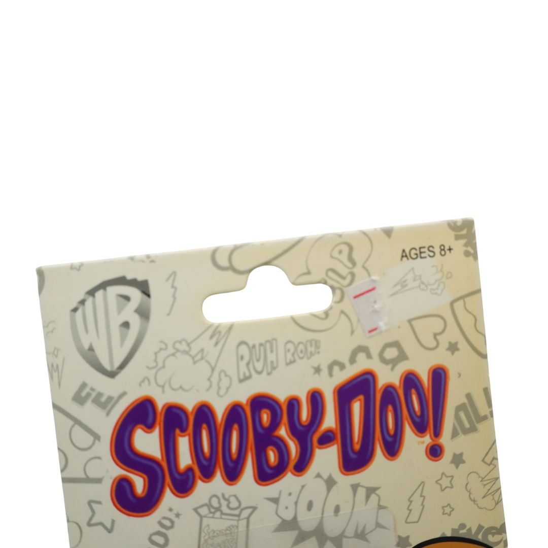 A packaged Scooby-Doo! card or accessory on a plain white background, with the WB logo and large 'Scooby-Doo!' text visible on the front.