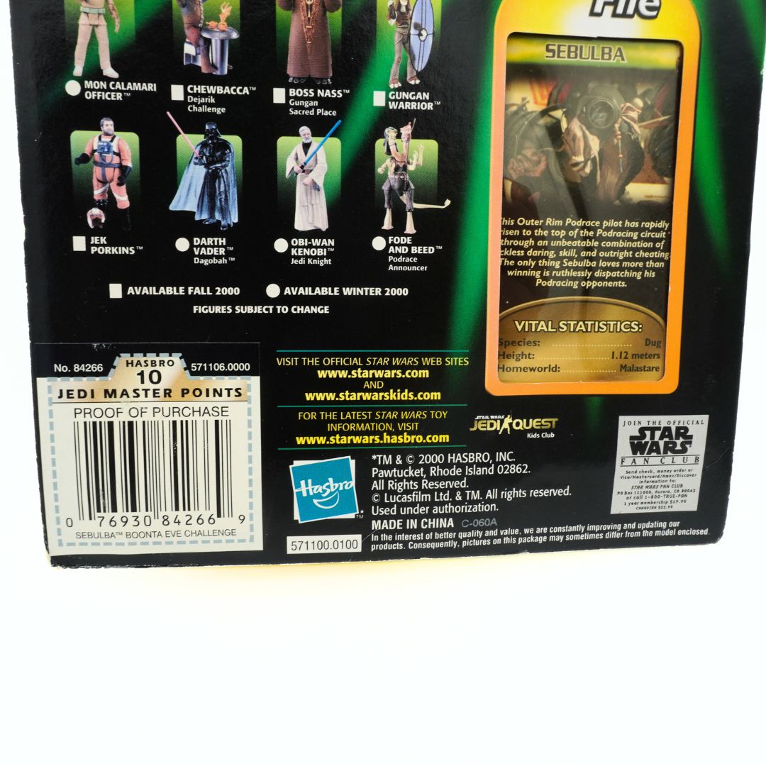 Back of a Star Wars action figure packaging with character illustrations and product details.
