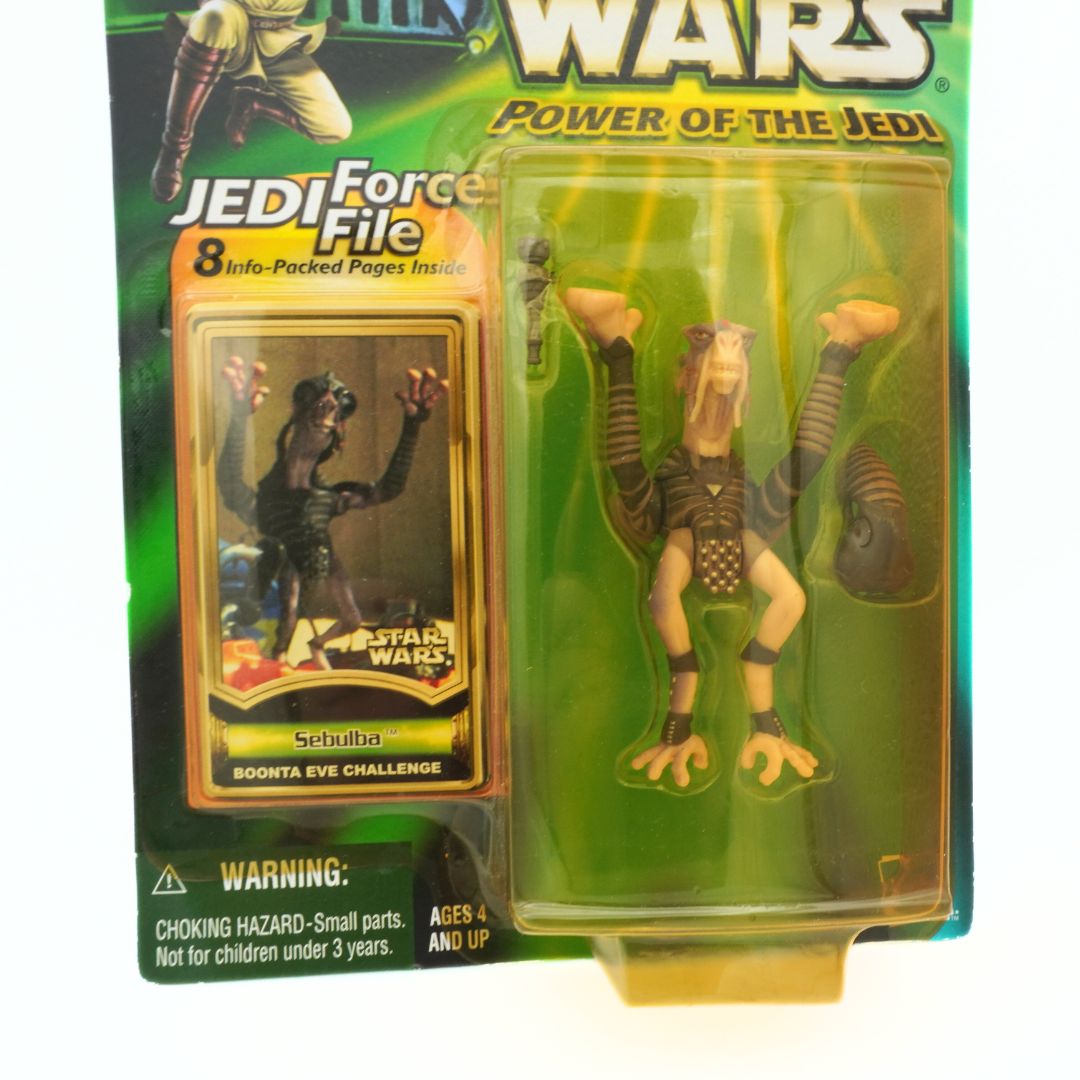 Star Wars action figure in packaging with Jedi Force File and Sebulba card.