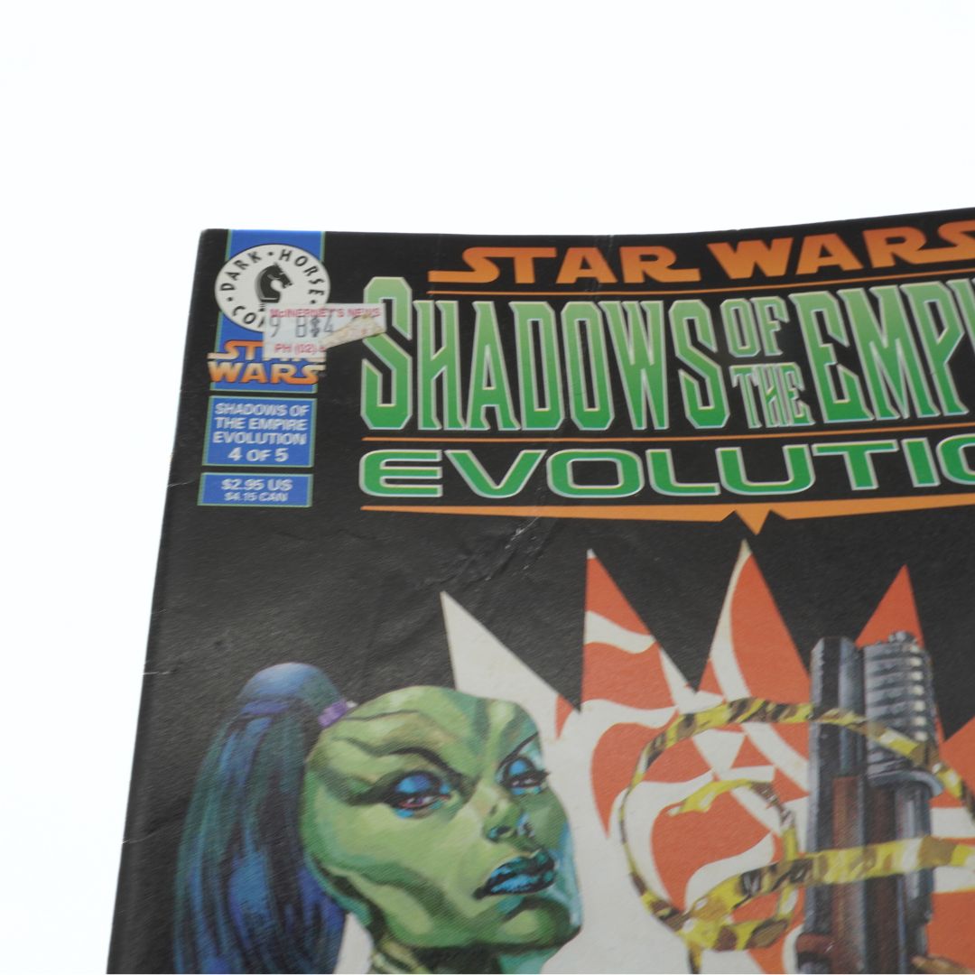 Comic book cover of 'Star Wars: Shadows of the Empire Evolution' with a character and stormtrooper on a black background.