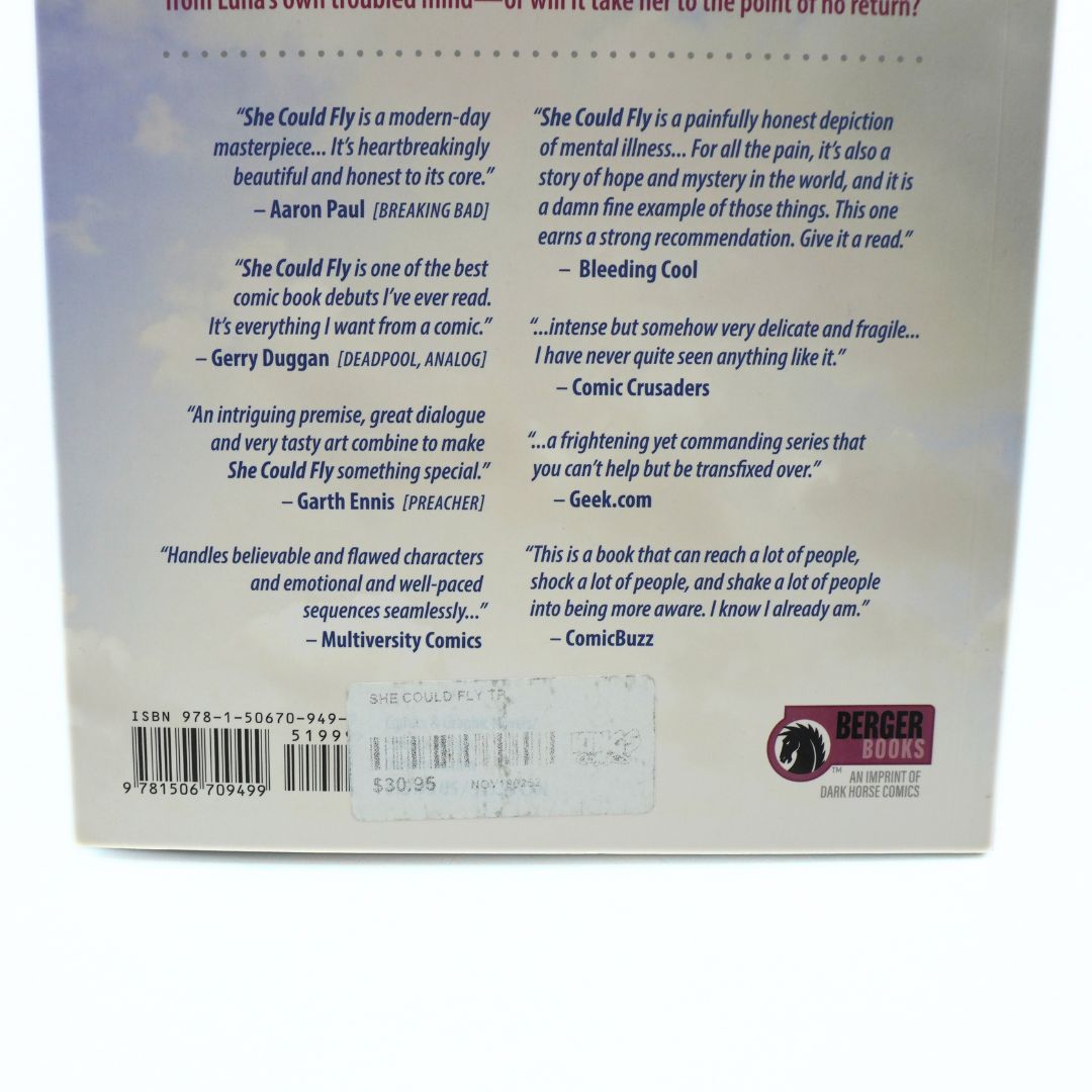 Back cover of the book 'She Could Fly' by Berger Books, featuring multiple book reviews, a barcode, and the Berger logo.