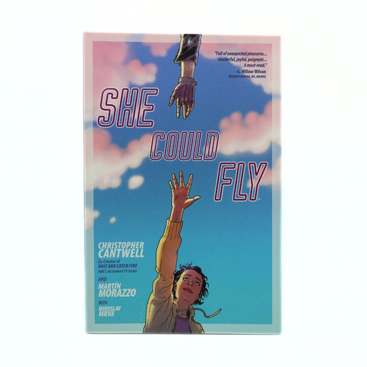 The front cover of the graphic novel 'She Could Fly' by Christopher Cantwell and Martin Mobazzo, featuring an illustration of a hand reaching up to a glove on a blue sky with clouds.