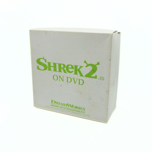 White box with green text 'Shrek 2' and 'DreamWorks' on a white background