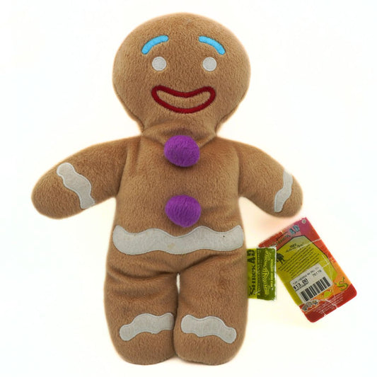 Plush gingerbread man toy with a tag on a white background