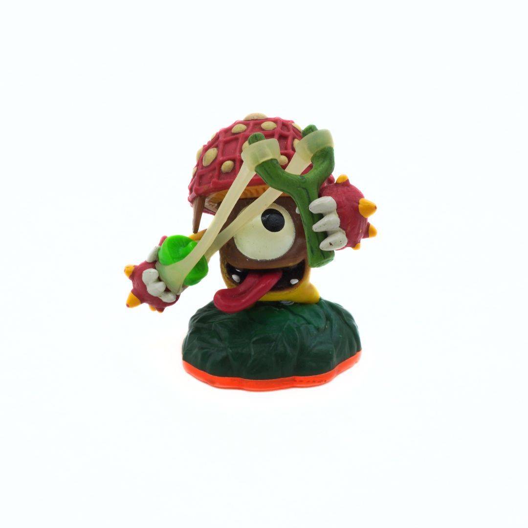 Colorful figurine with a mushroom-like top on a white background