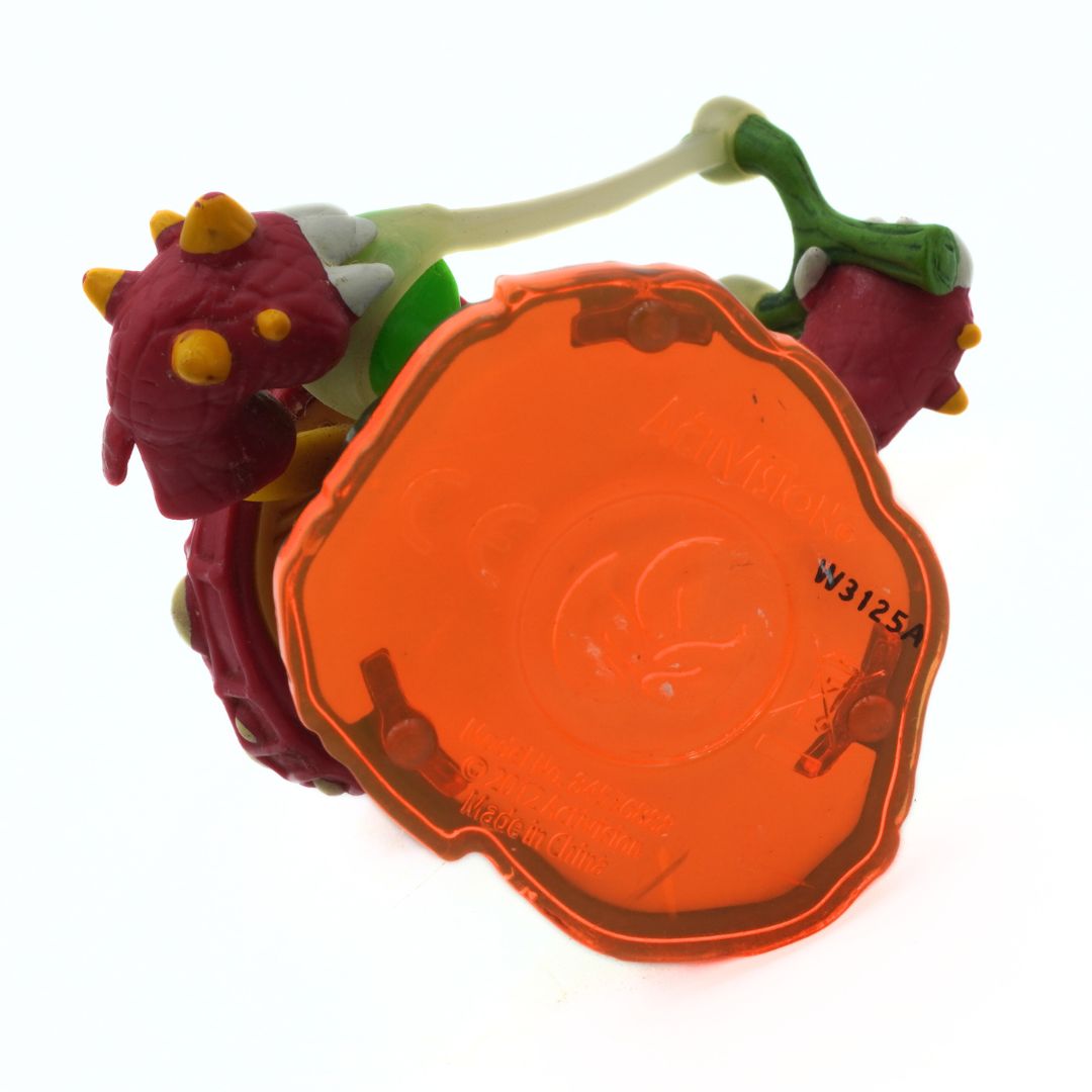 Colorful toy with an orange transparent base on a white background
