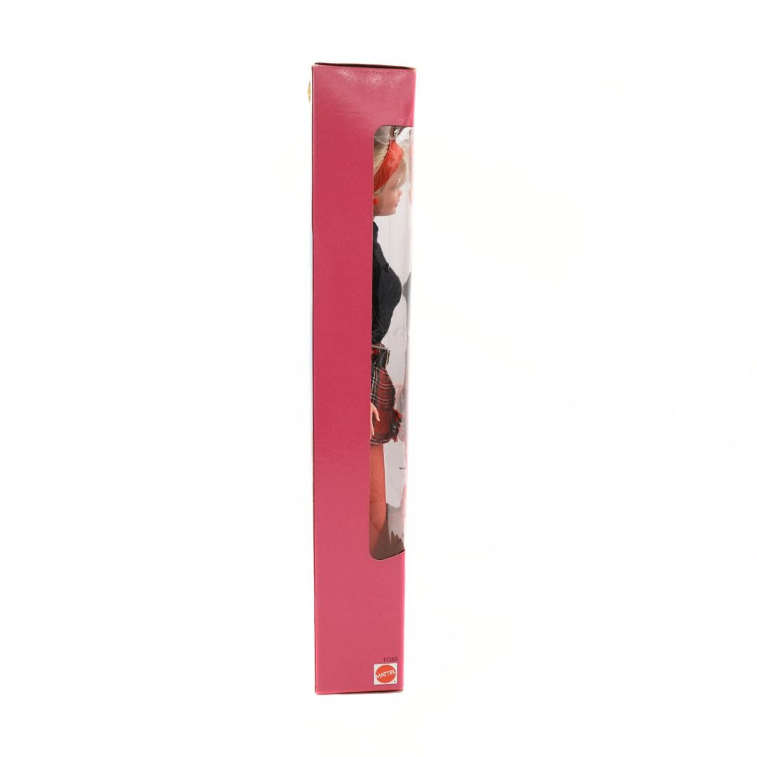 Side on image of the Classmate Barbie in packaging