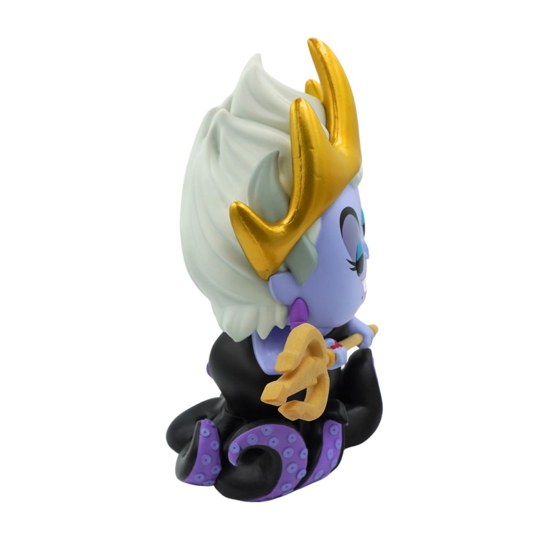 Jumbo sized purple Ursula figurine from the Little Mermaid with a gold crown and black dress