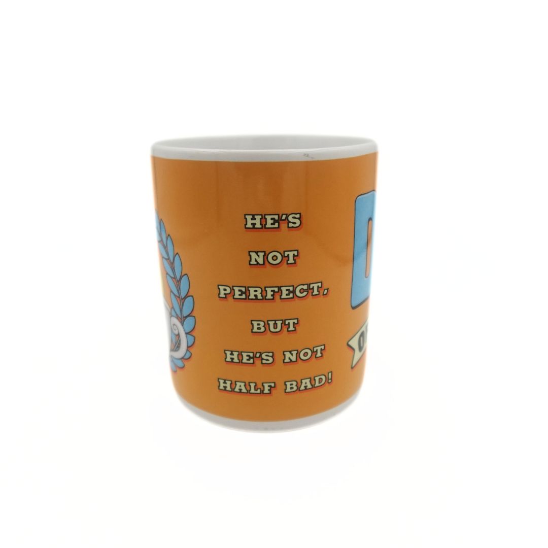 Back of a Homer Simpson mug reading 'He's Not Perfect, But He's Not Half Bad!' on an orange background