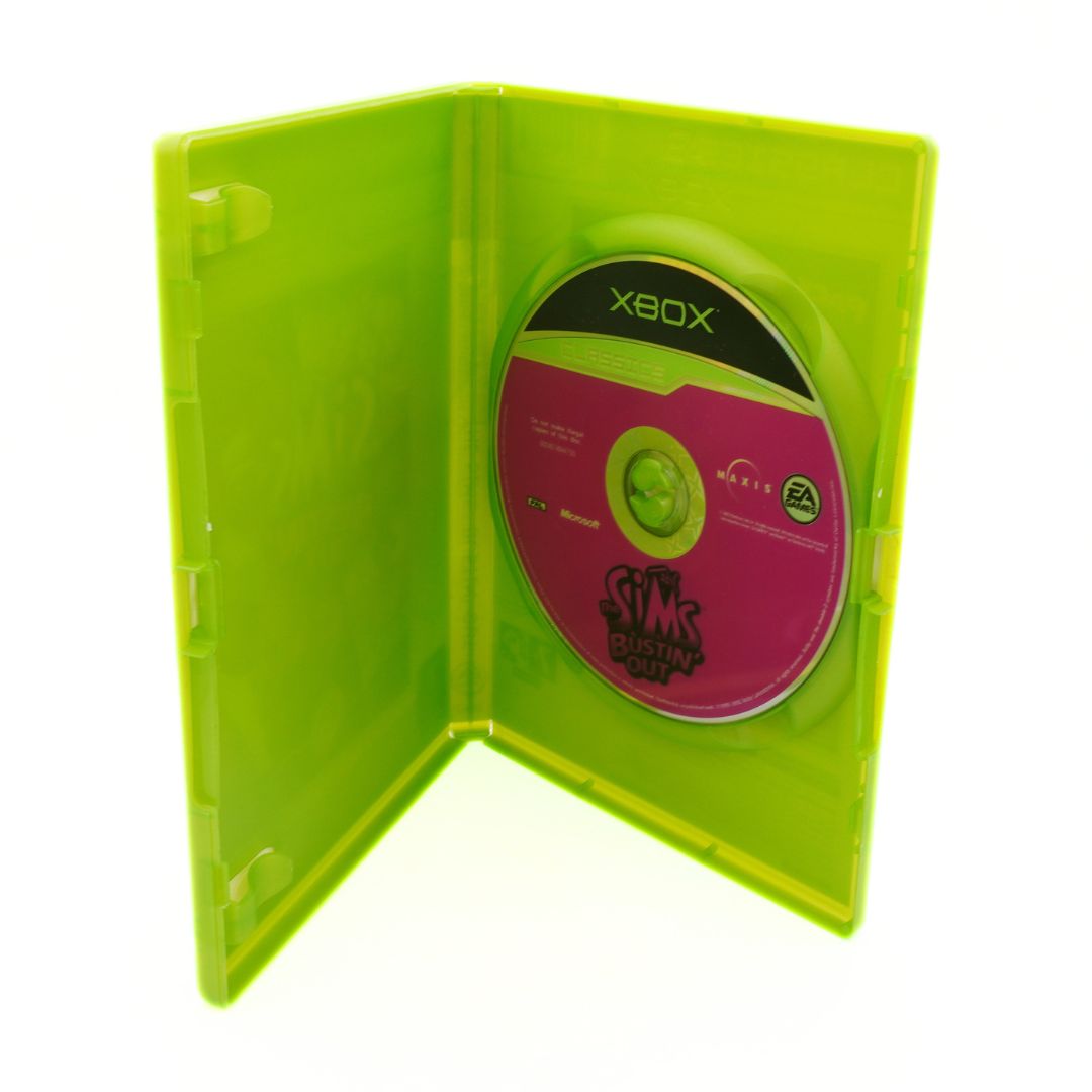Green Xbox game case with a pink disc on a white background