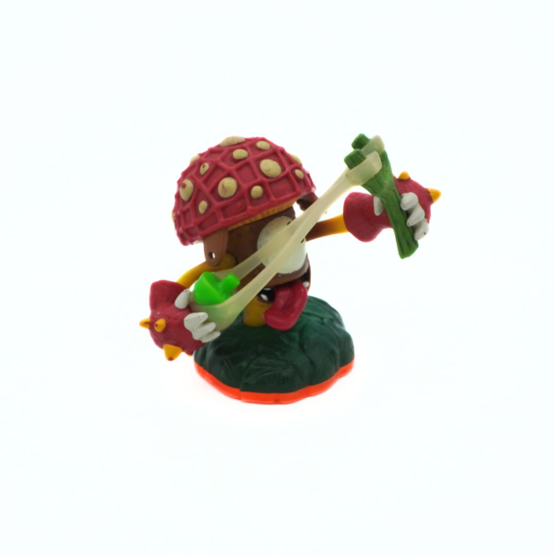Toy figure of a character with a mushroom hat and bow on a white background